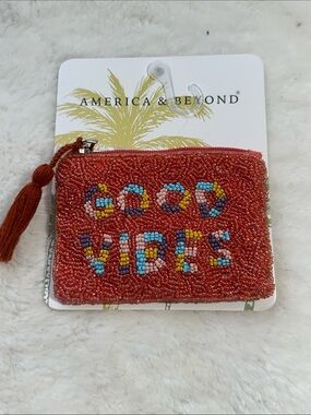 America & Beyond beaded burnt orange mini pouch